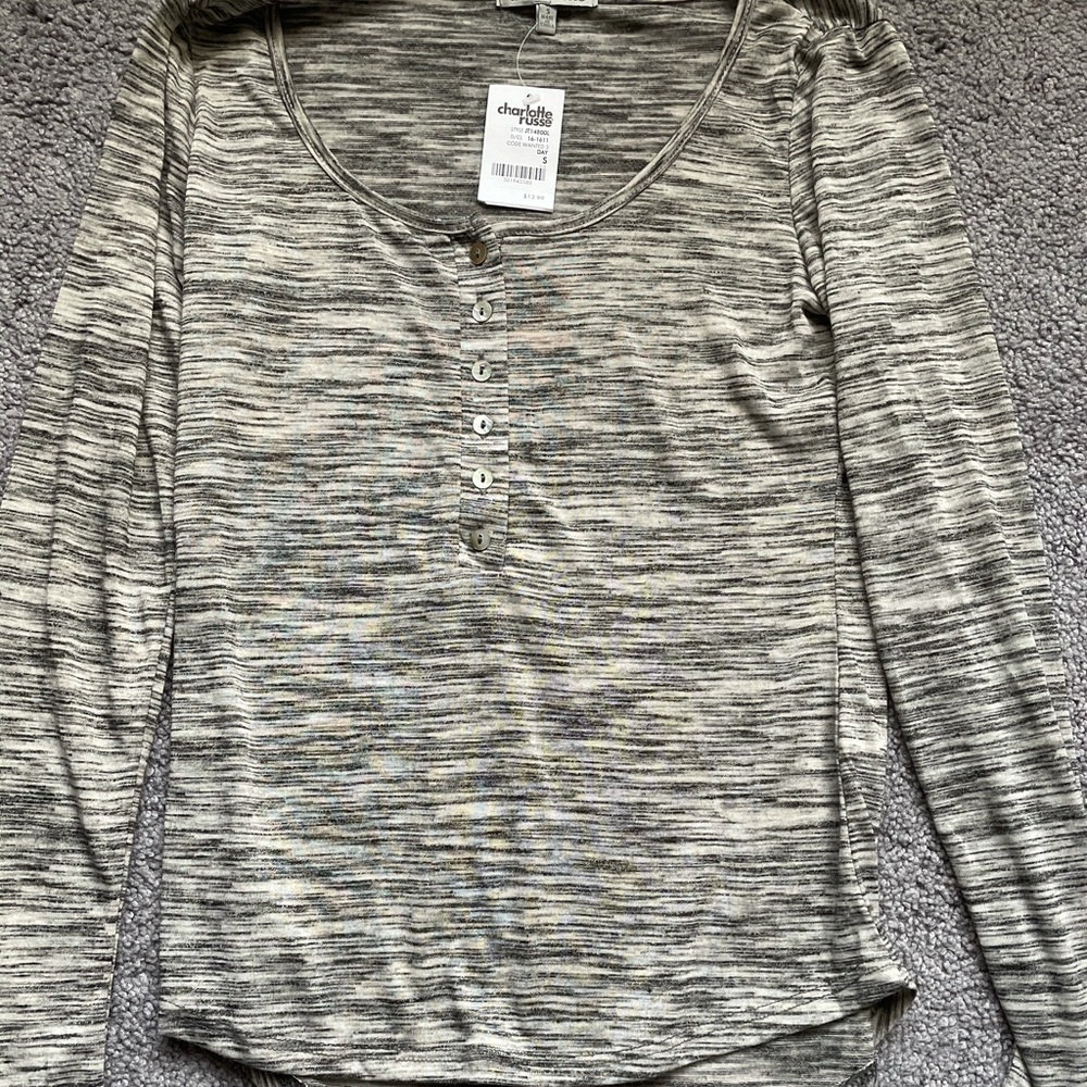 Grey, white and black long sleeve stripped shirt. Small. NWT